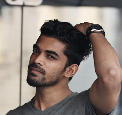 Handsome man hand in hair